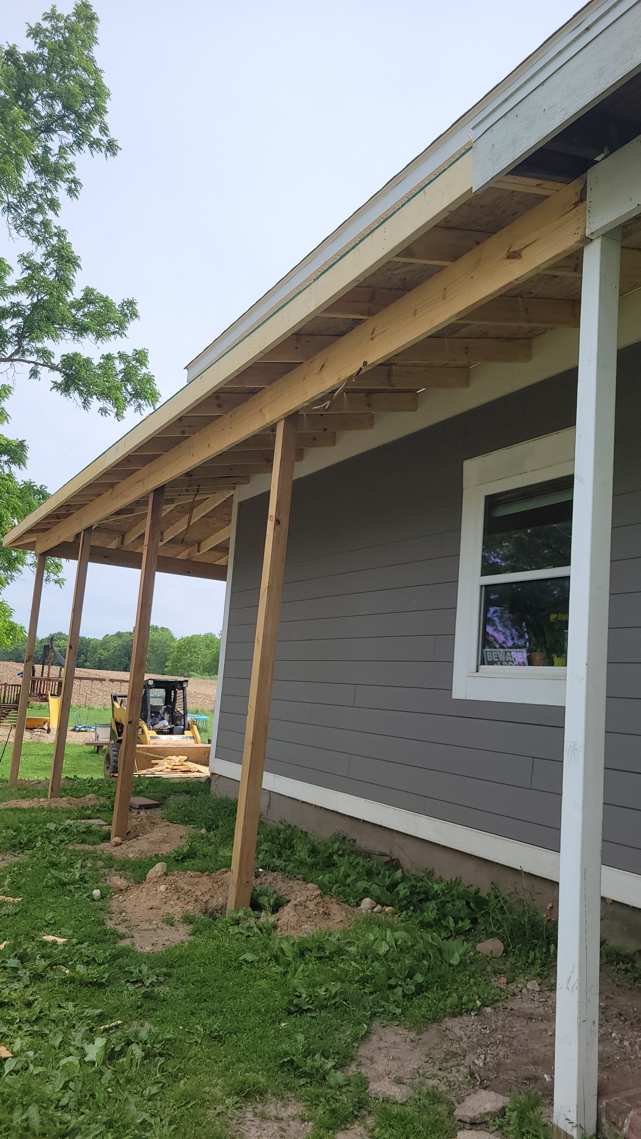 During — covered porch framing