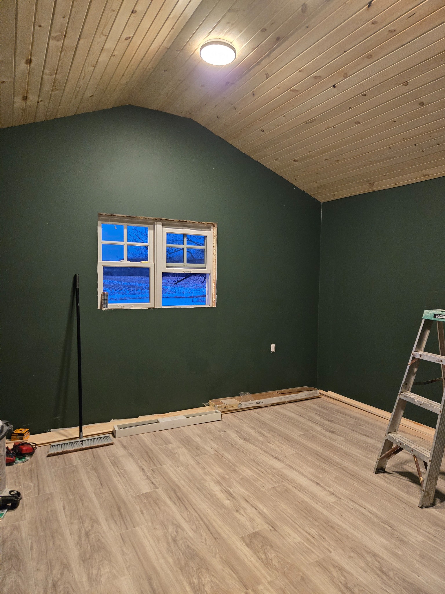 Interior project — flooring installed, trim in progress
